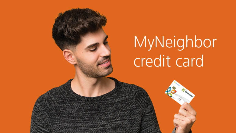 Man holds MyNeighbor credit card